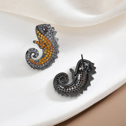 Black Metal Chameleon Studs with Orange and Grey Stones